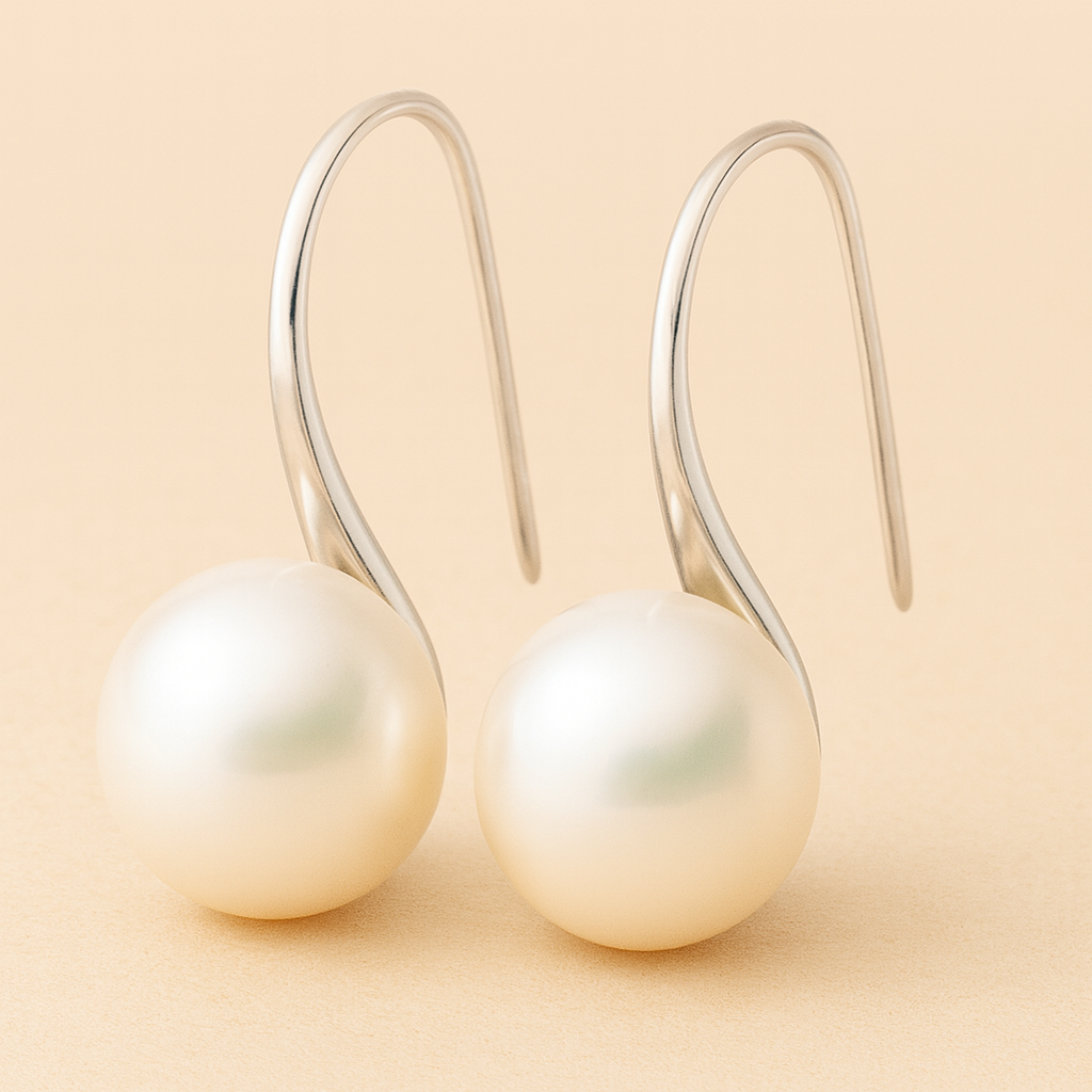 Elegante Tropfenohrringe mit Perlen