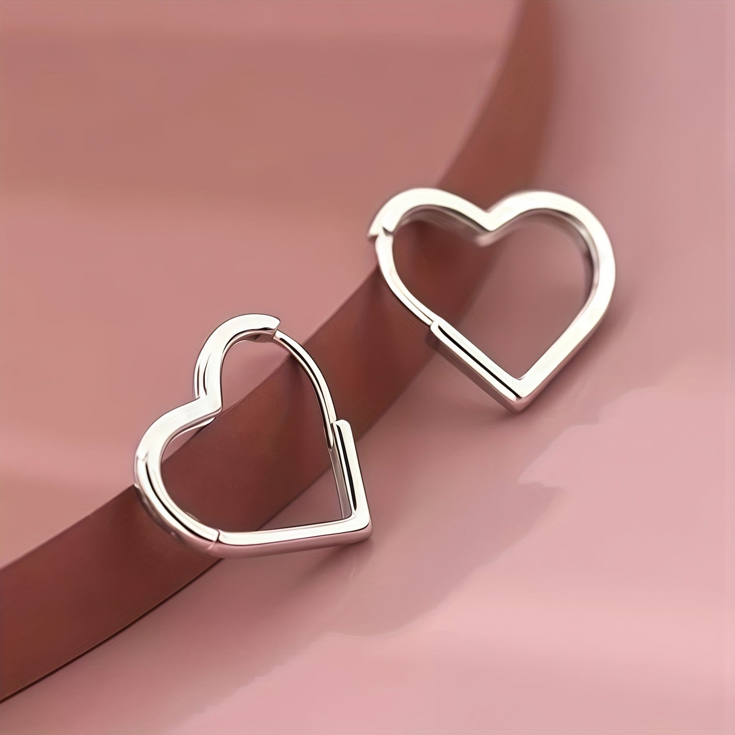 Herzförmige Ohrringe aus Edelstahl in Gold