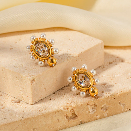 Elegante Ohrringe aus Gold mit Perle