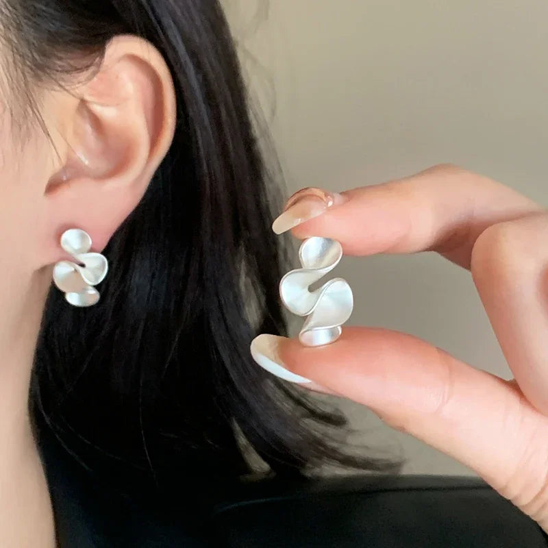 Blumenohrringe aus Silber und 18K Gold