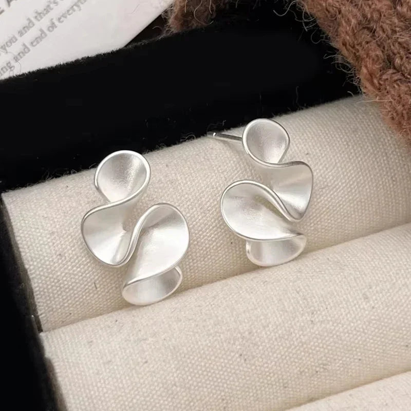 Blumenohrringe aus Silber und 18K Gold