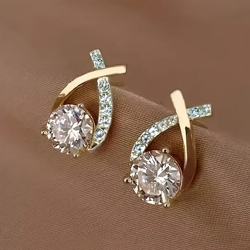 Ohrringe mit goldenem Kreuz und Zirkonia