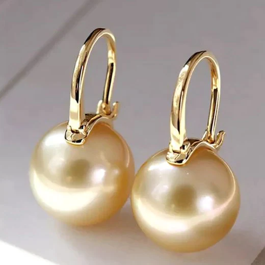 Elegante Ohrringe aus Gold mit Perlen