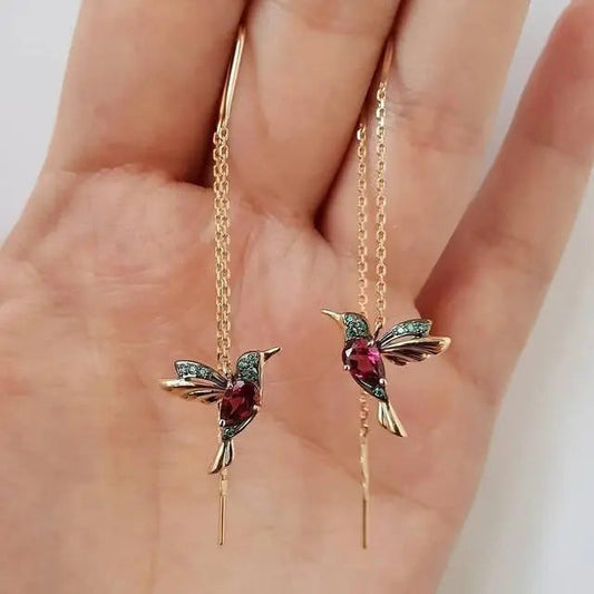 Ohrringe mit Kolibri aus Gold und Kristallen